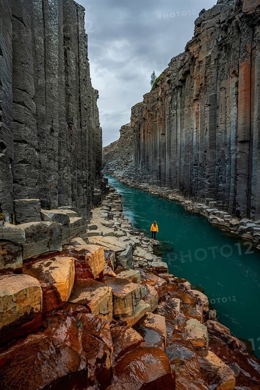 Tourist at Stuolagil Canyon