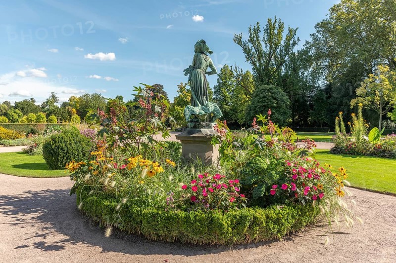 Statue of Lison with geese in the park of the orangery in Strasbourg