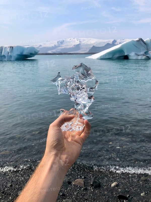 Hand holding ice