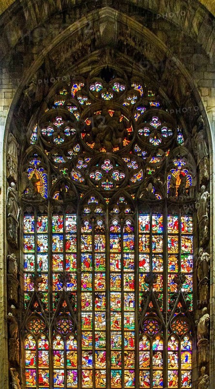 14th century Milan Cathedral stained glass windows in white marble