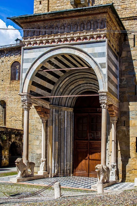 South entrance to the Cathedral of Santa Maria Maggiore with white lions
