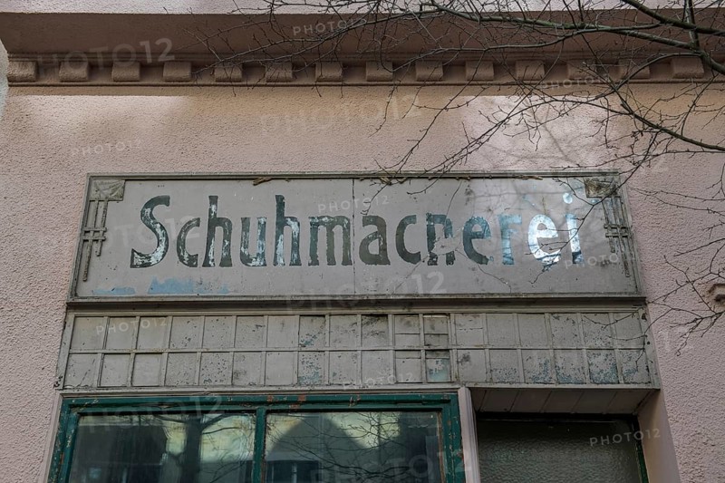 Old sign Schuhmacherei