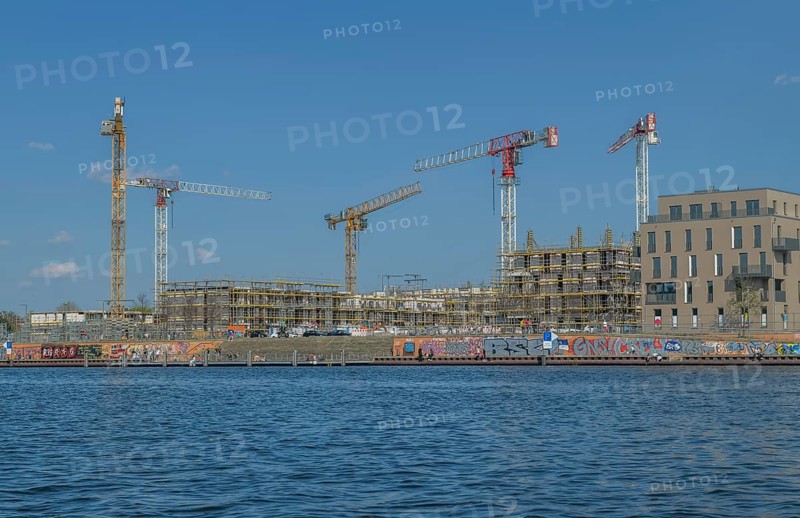 Waterkant development area with building site and construction cranes