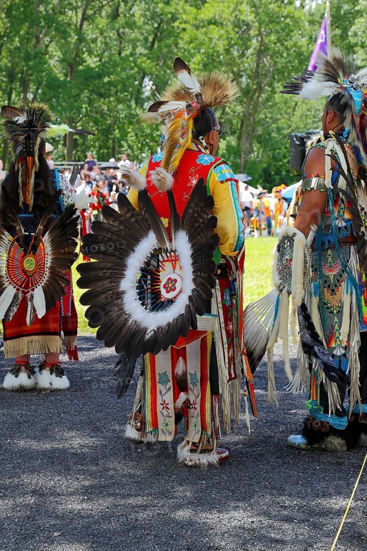 Native Americans with colorful dress at a Pow Wow