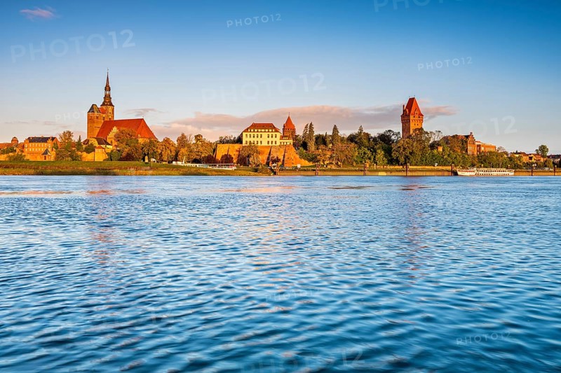 View over the Elbe to the old town with St. Stephan's Church in the morning light