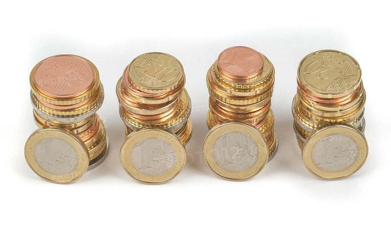 Stack of cent coins and euro coins