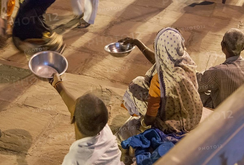 Asking for some rice People on the banks of the Ganges
