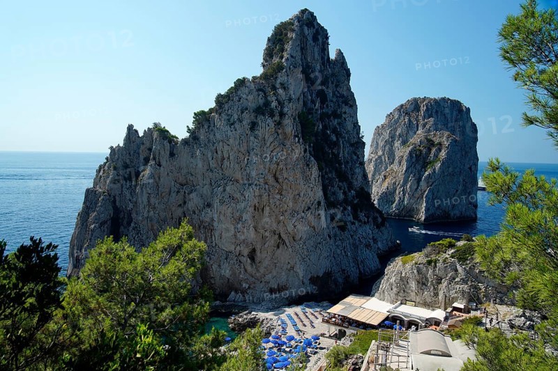 Rocky coast with boats on the sea