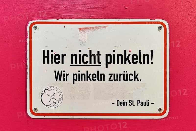 Sign No peeing here. We pee back. Your St. Pauli