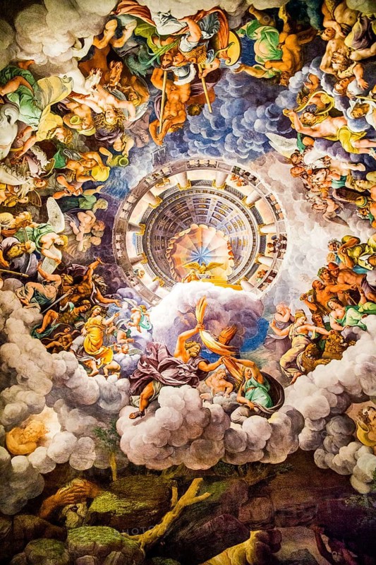 Most famous fresco of Mannerism: Giulio Romano's illusion invents a dome and dissolves the architecture of the room into the fall of the giants
