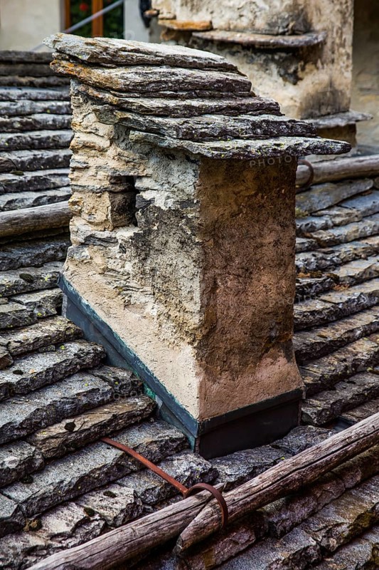 Characteristic old buildings in stone and wood in the village of Fusio