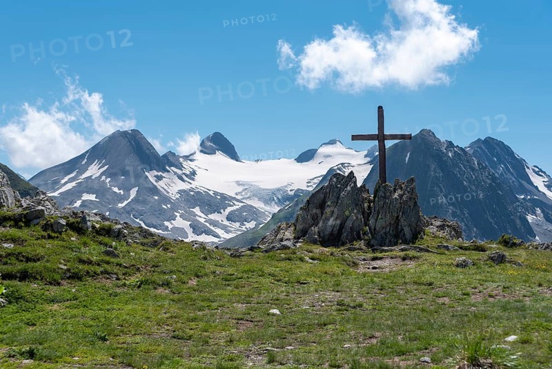 Nufenen Cross in Alpine Landscape near Nufenen Pass