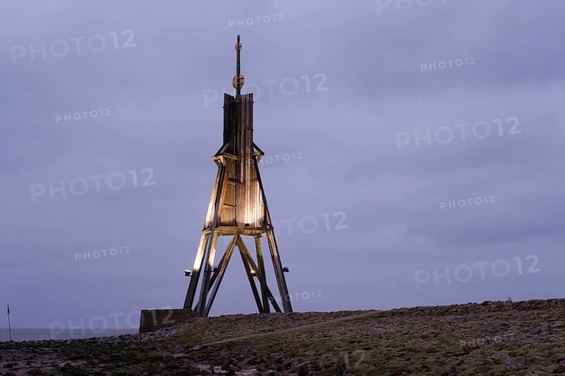 Illuminated Kugelbake at blue hour