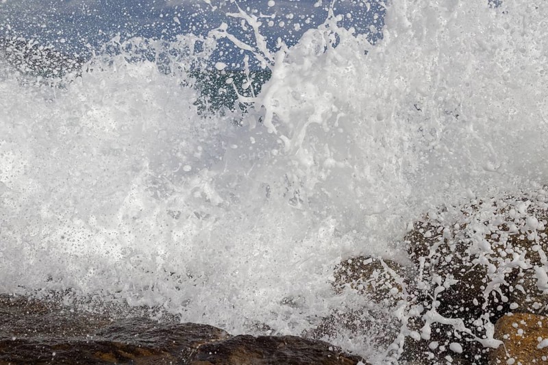 Strong swells during storm break on seawall in Sanremo