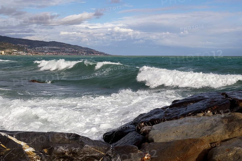 Strong swells during storm break on seawall in Sanremo