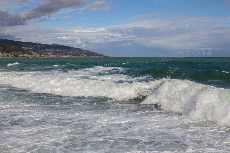Strong swells during storm break on seawall in Sanremo