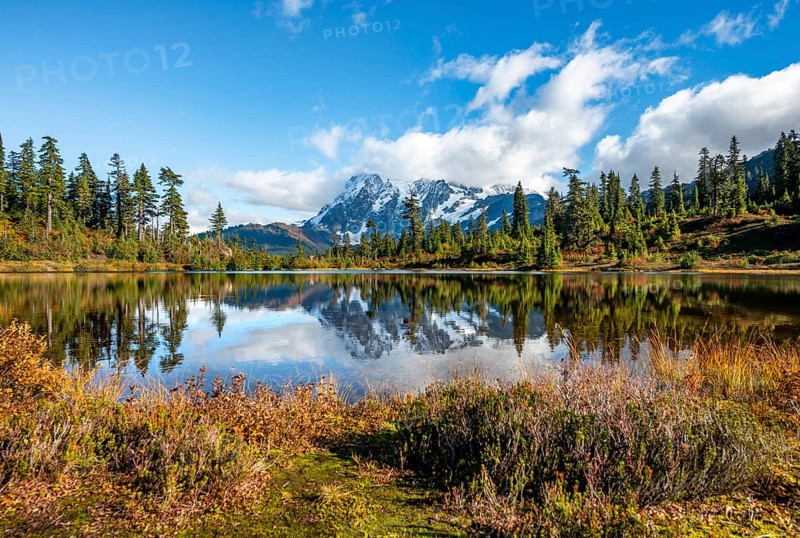 Mt. Shuksan glacier with snow reflecting in Picture Lake