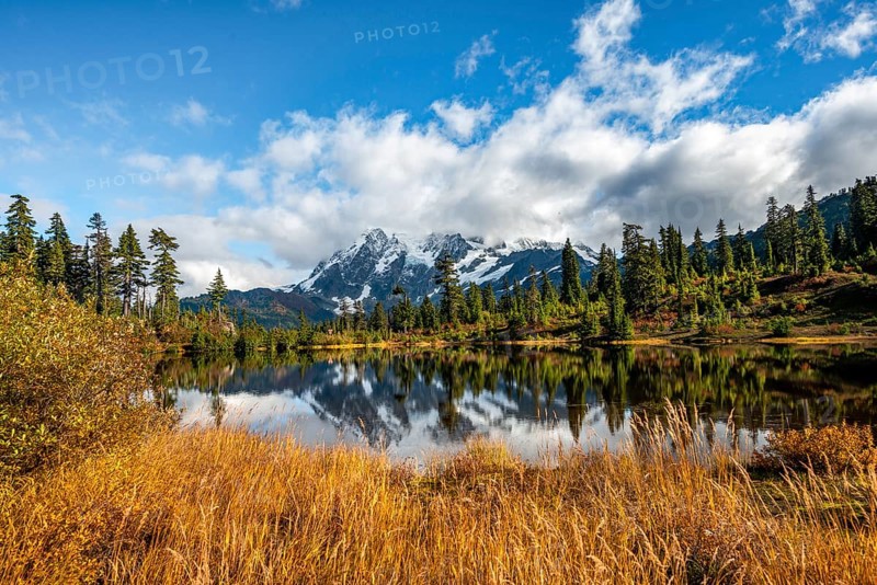 Mt. Shuksan glacier with snow reflecting in Picture Lake