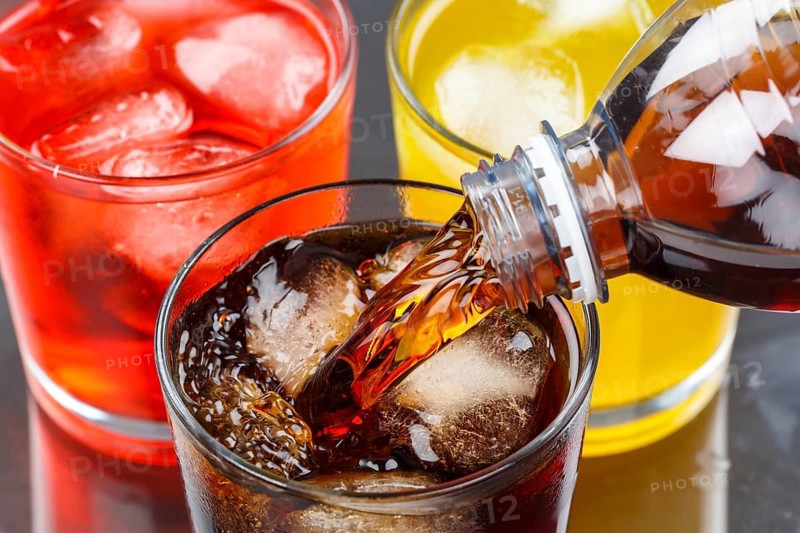 Drinks Pouring Lemonade Cola Soft Drinks in a Glass