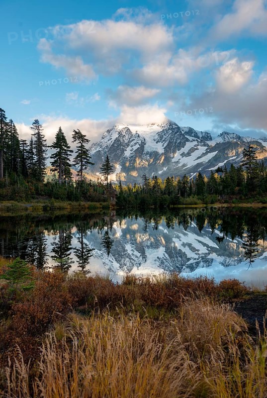 Mt. Shuksan glacier with snow reflecting in Picture Lake