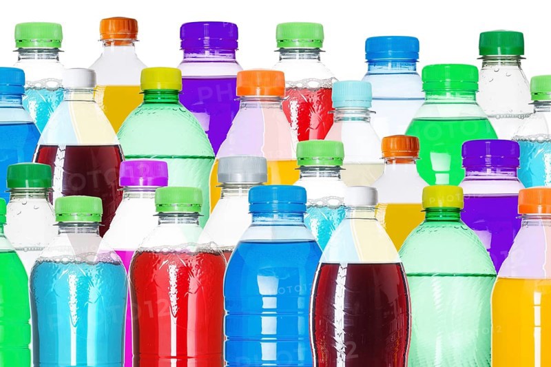 Bottles with colourful drinks