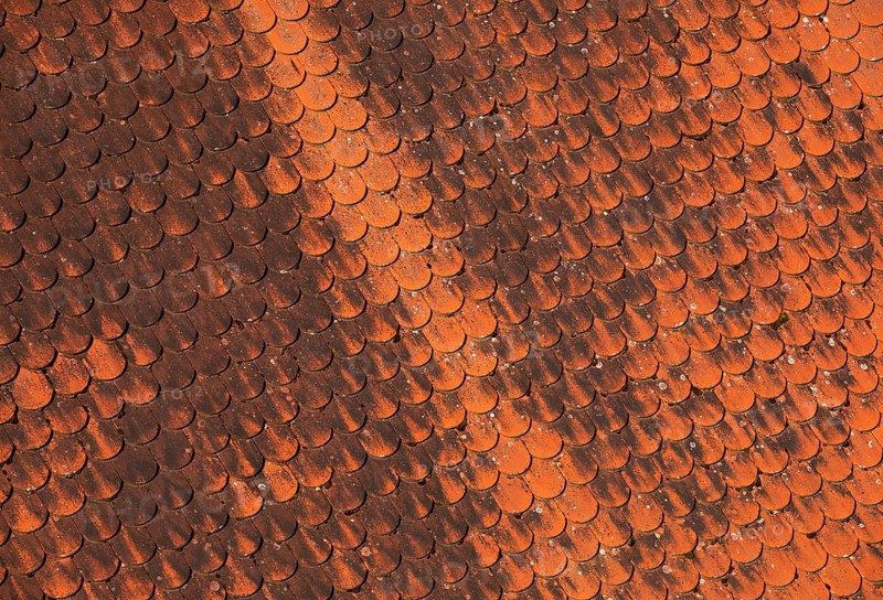Detail of a red old tiled roof