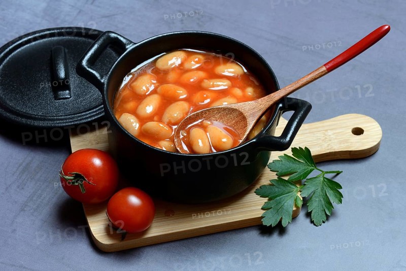 White beans with tomato sauce in pots