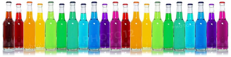 Bottles with colourful drinks