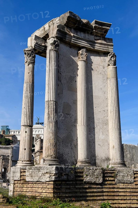 Partially restored historic cella of Temple of the Vesta on brick foundation wall