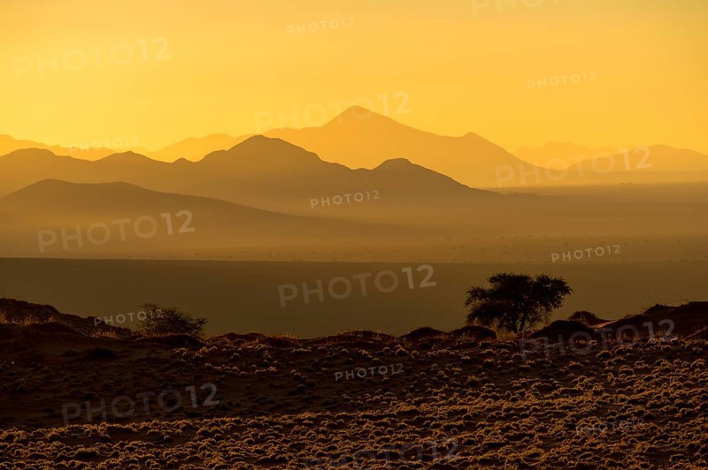 Streak of sunrise light in Namib Rand Nature Reserve