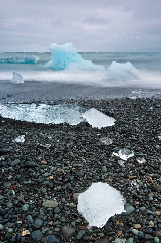 Chunks of ice on the black lava beach Diamond beach