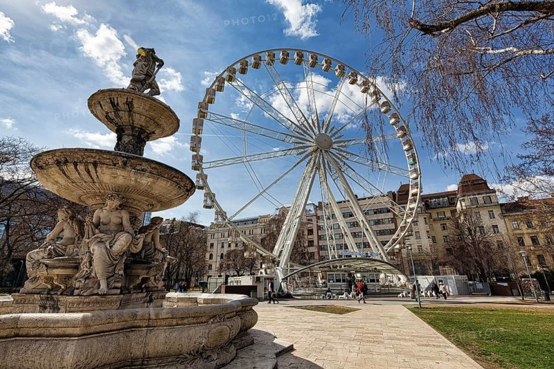 Danubius Fountain and Budapest Eye Ferris Wheel