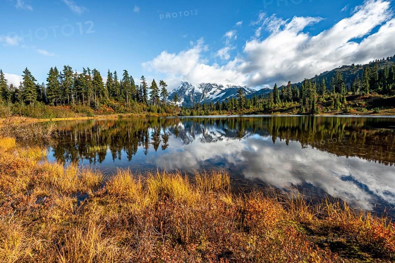 Mt. Shuksan glacier with snow reflecting in Picture Lake