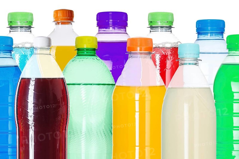 Bottles with colourful drinks
