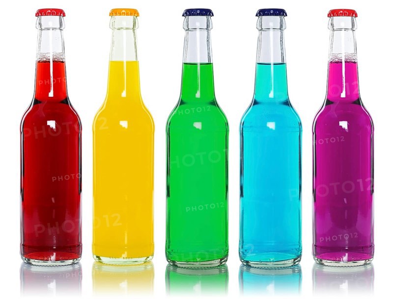 Bottles with colourful drinks