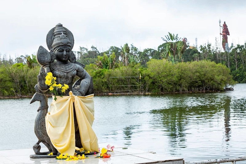Statue of Lord Muruga at the sacred lake of Ganga Talao in the south of the island of Mauritius