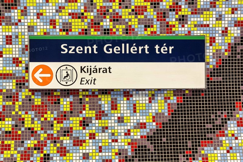 Sign with lettering Szent Gellert ter on colourful wall with mosaic