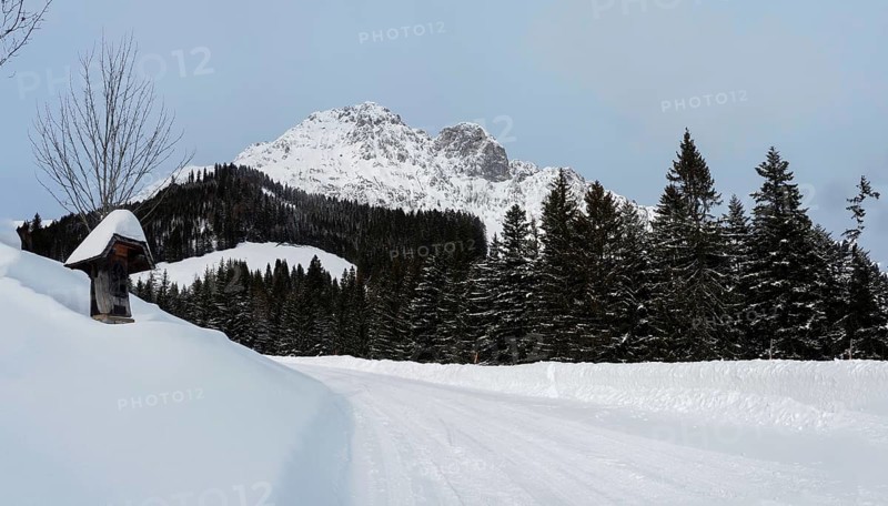 View of the snow-covered Bosruck mountain range