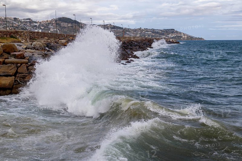 Strong swells during storm break on seawall in Sanremo