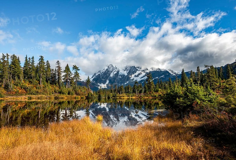 Mt. Shuksan glacier with snow reflecting in Picture Lake