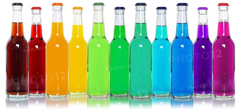 Bottles with colourful drinks