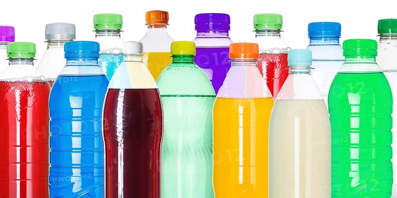 Bottles with colourful drinks