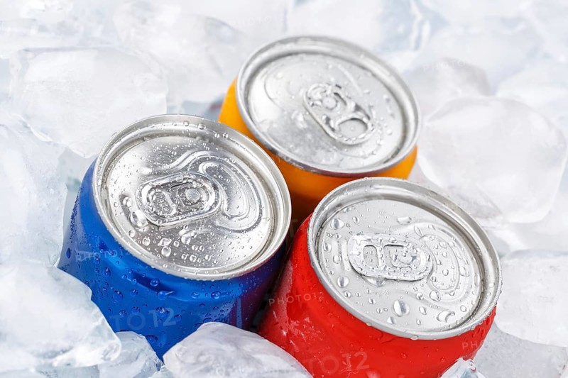 Beverages Lemonade Cola Soft drinks in cans Beverage cans on ice cube Ice cubes in