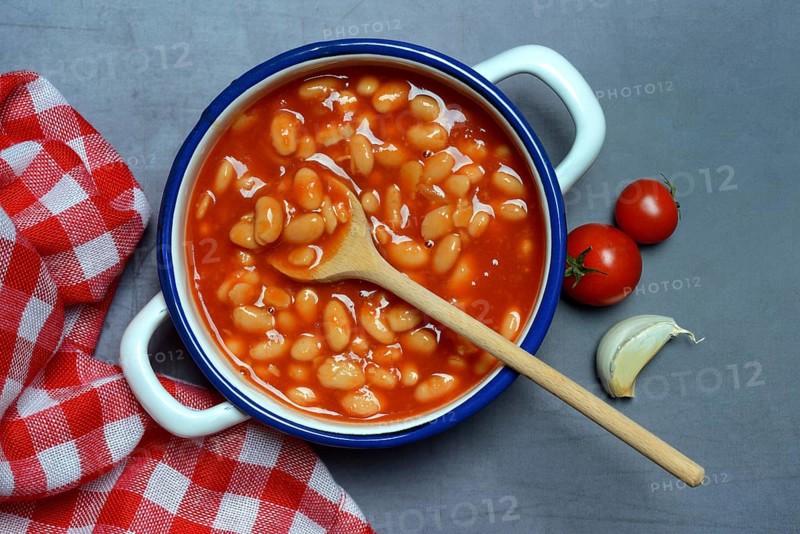 White beans with tomato sauce in pot