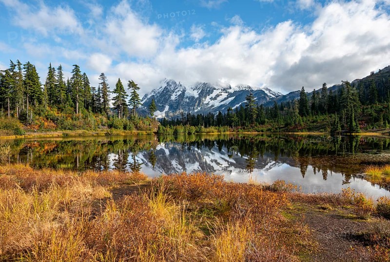 Mt. Shuksan glacier with snow reflecting in Picture Lake