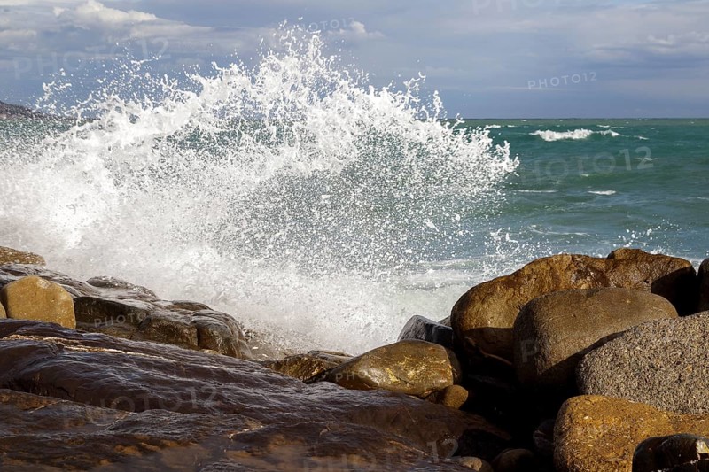 Strong swells during storm break on seawall in Sanremo