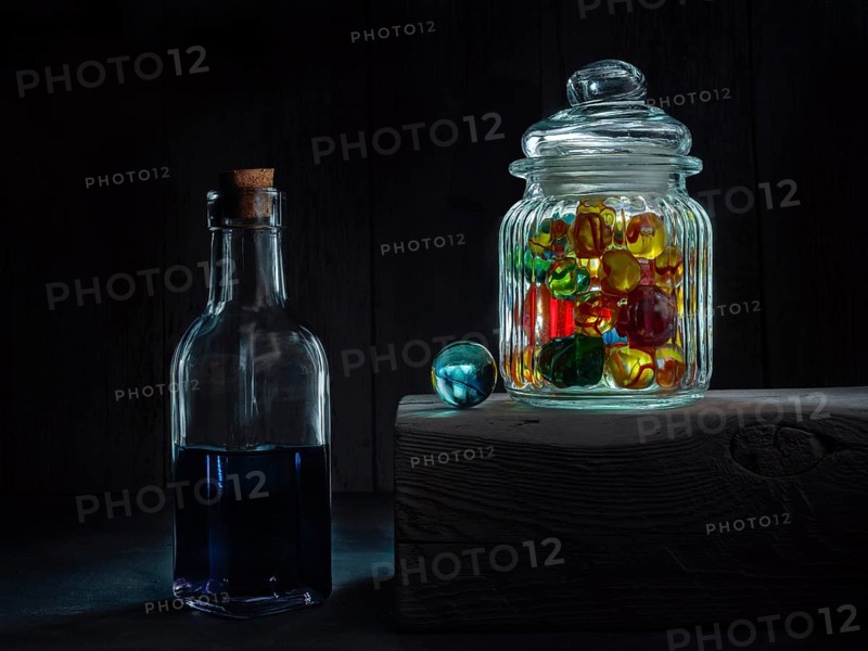 Still life with glass bottle