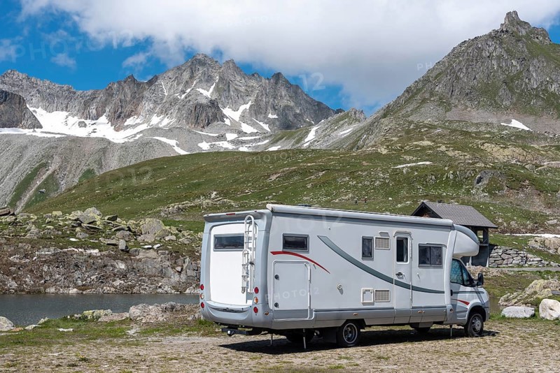 Motorhome in alpine landscape near Nufenen Pass