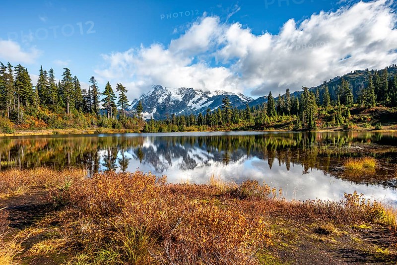 Mt. Shuksan glacier with snow reflecting in Picture Lake