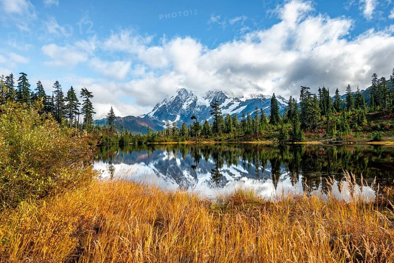 Mt. Shuksan glacier with snow reflecting in Picture Lake